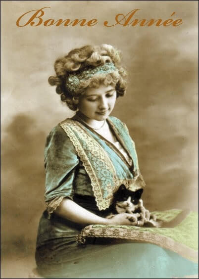 Cartes postales de Voeux de fin d'année : Carte ancienne - Dame et son chat