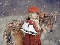 Fond d'écran Animaux de Noël - Fillette et loup sous la neige